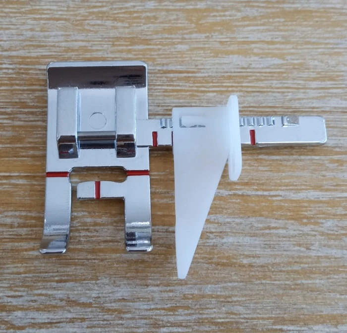 PRENSATELAS CON GUÍA AJUSTABLE