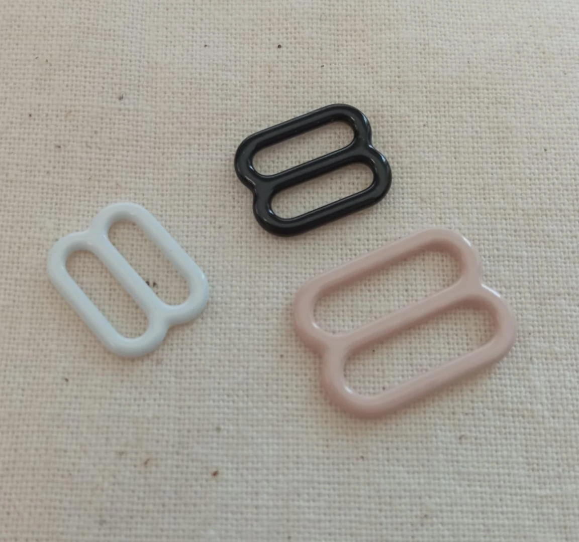 REGULADOR MÉTALICO DE SUJETADOR 10 MM BLANCO