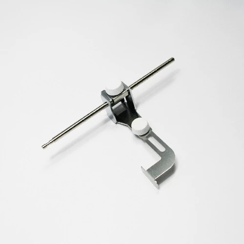 GUÍA REGULABLE PARA RECUBRIDORA ELNA